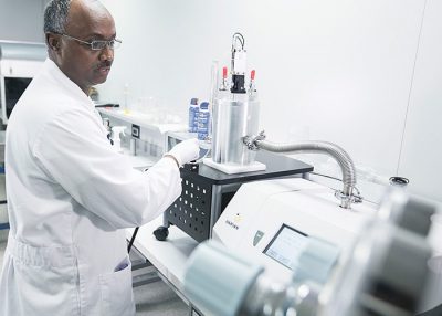 a uniformed man in the laboratory